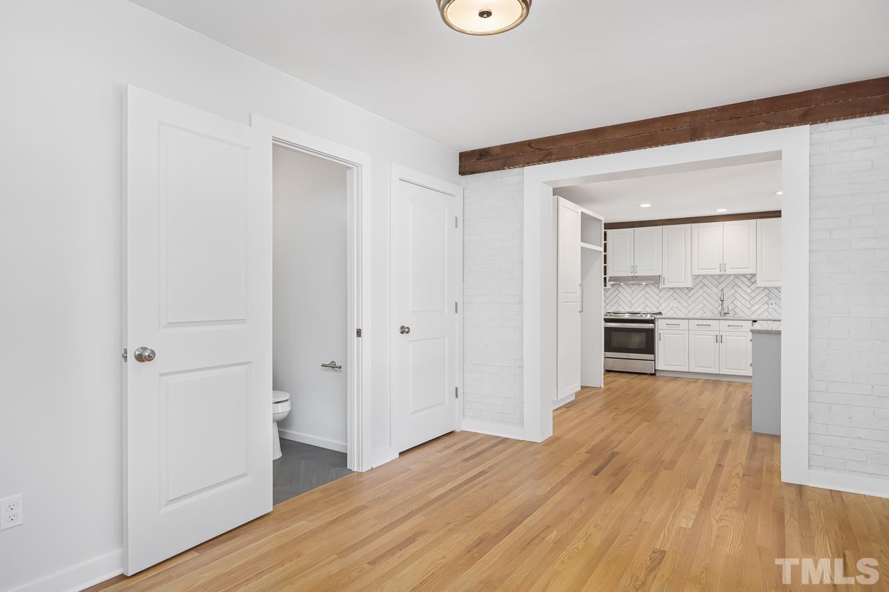 500 Doby Circle Raleigh, NC 27610 - Photo 12 of 40 a view of a kitchen with wooden floor and a sink