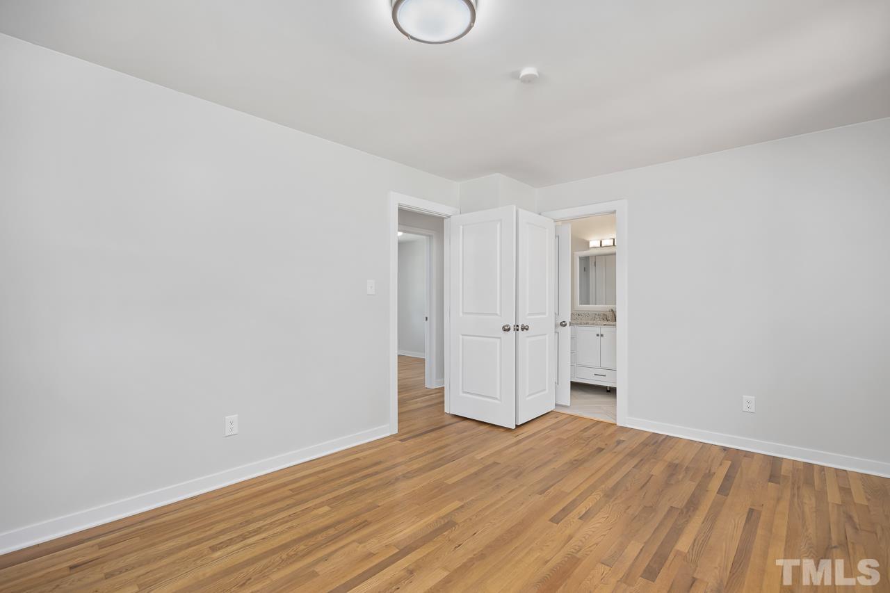 500 Doby Circle Raleigh, NC 27610 - Photo 21 of 40 a view of a room with wooden floor and white walls