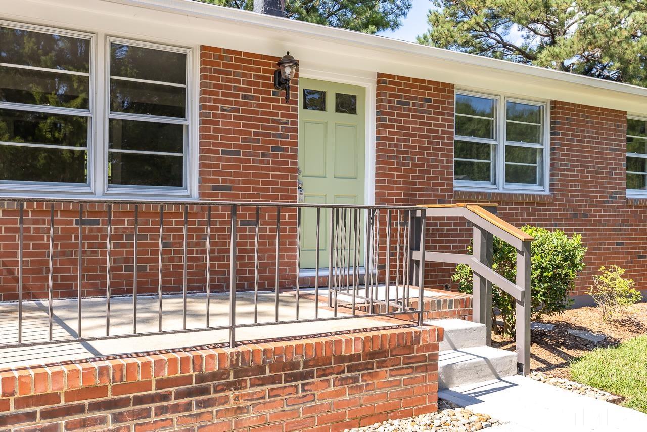 500 Doby Circle Raleigh, NC 27610 - Photo 39 of 40 a view of a brick house with many windows