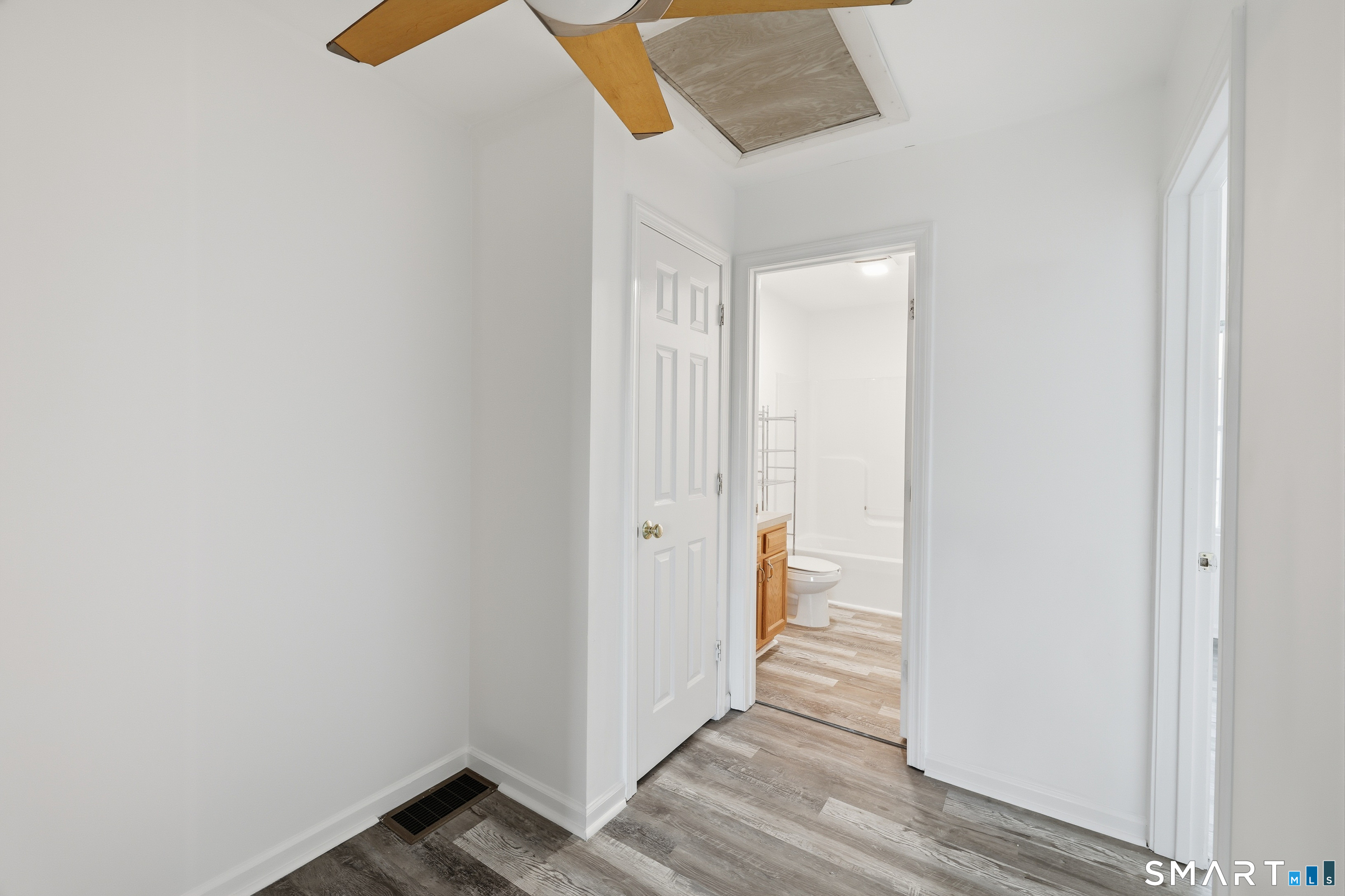 135 Bucks Hill Road, Unit 10 Waterbury, CT 06704 - Photo 11 of 20 a view of a room with wooden floor