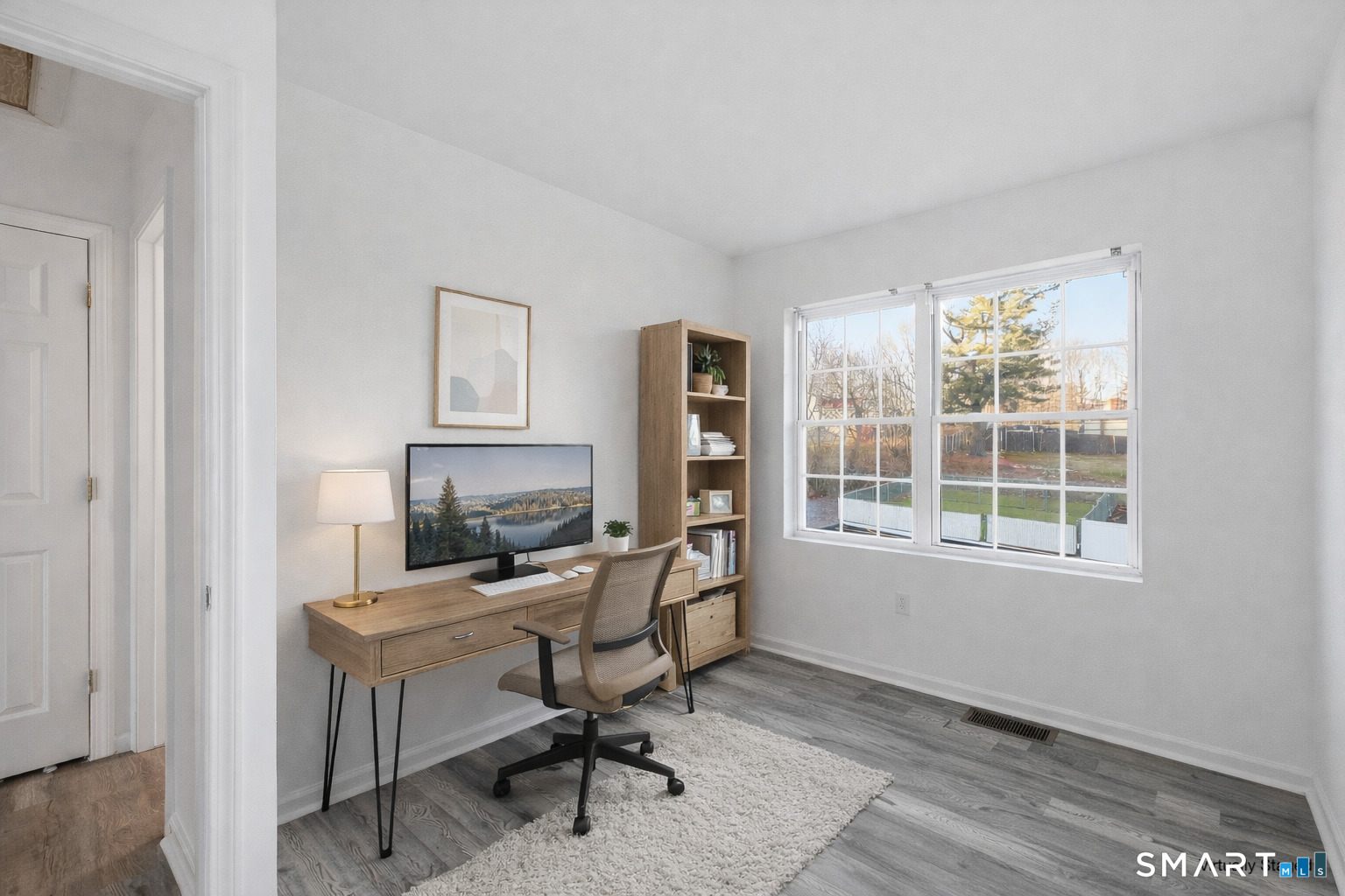 135 Bucks Hill Road, Unit 10 Waterbury, CT 06704 - Photo 15 of 20 a view of a workspace with furniture and a window
