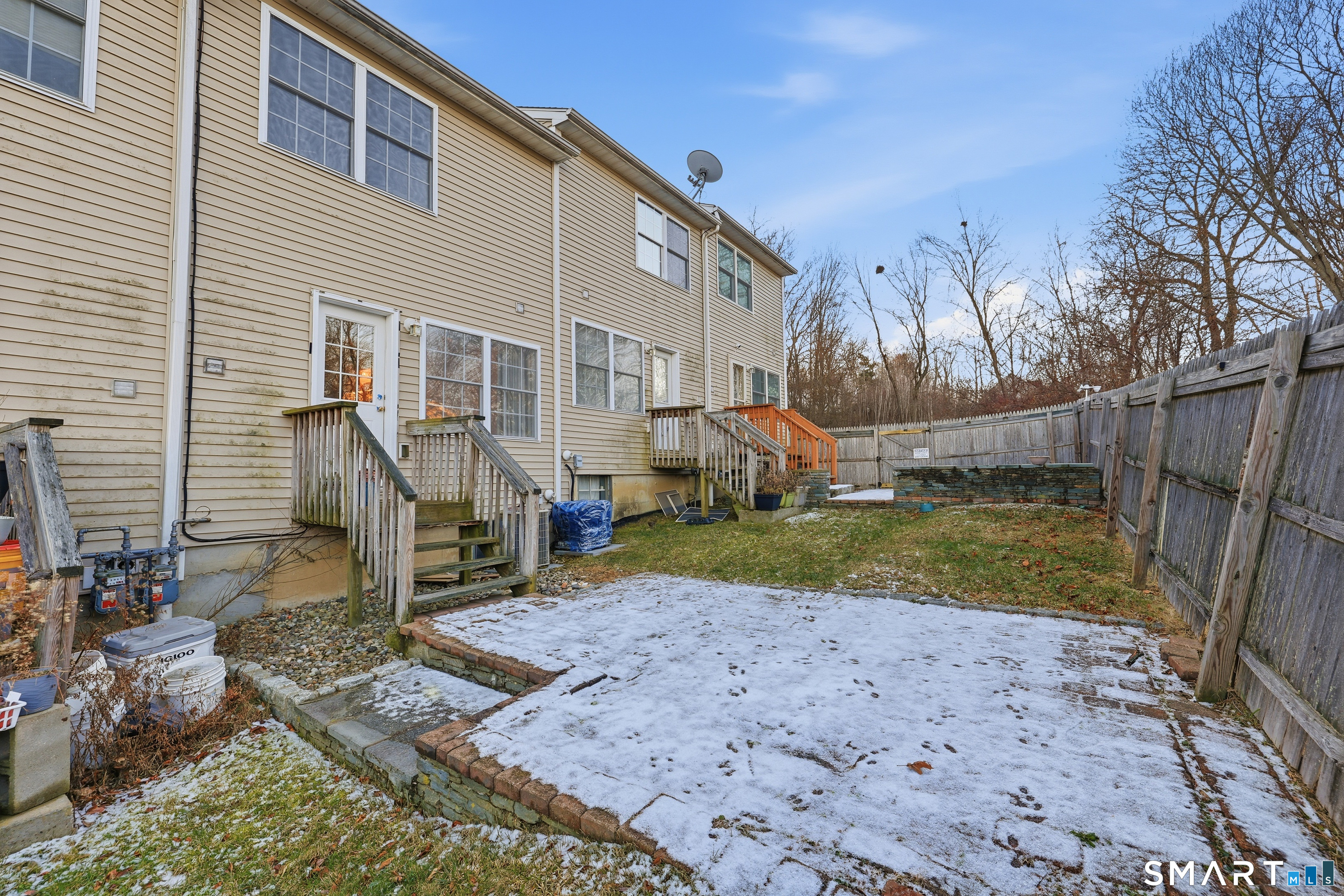 135 Bucks Hill Road, Unit 10 Waterbury, CT 06704 - Photo 18 of 20 a view of a house with a yard