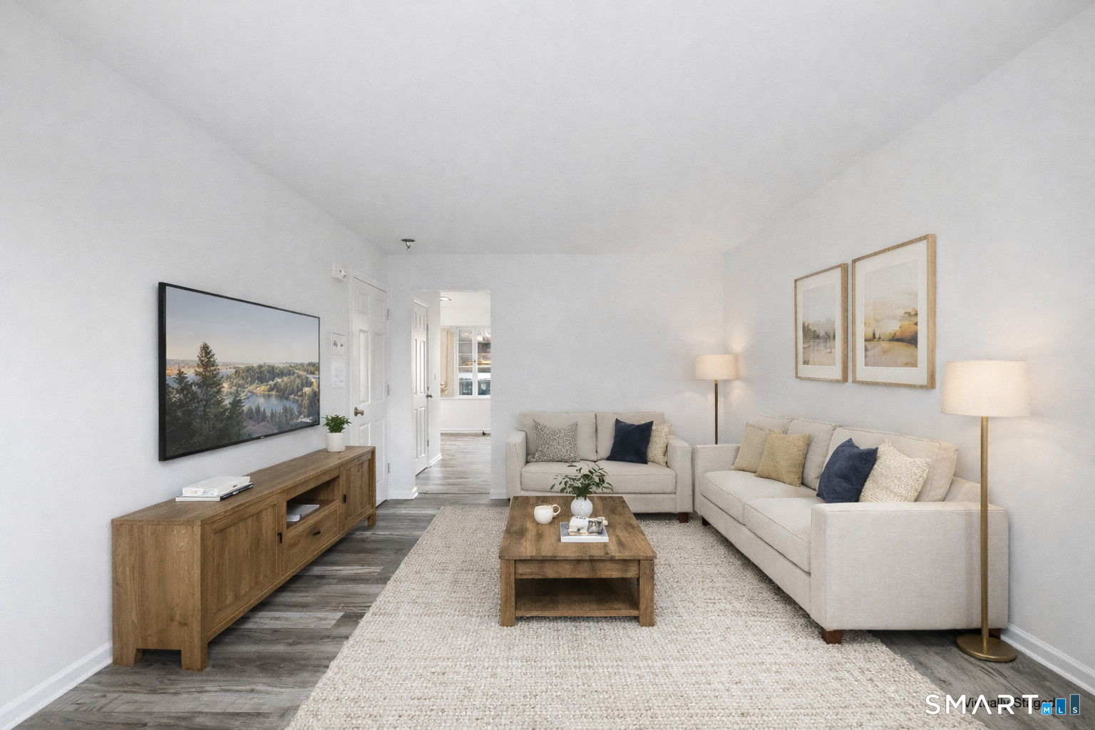 135 Bucks Hill Road, Unit 10 Waterbury, CT 06704 - Photo 2 of 20 a living room with furniture and a flat screen tv