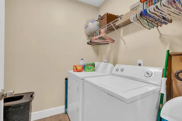 a utility room with dryer and washer