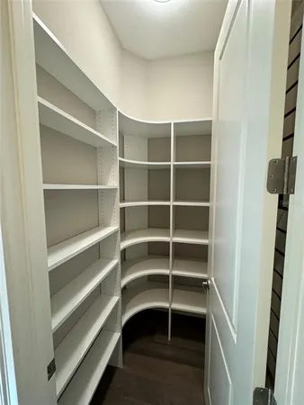 a view of a room with racks on the wall