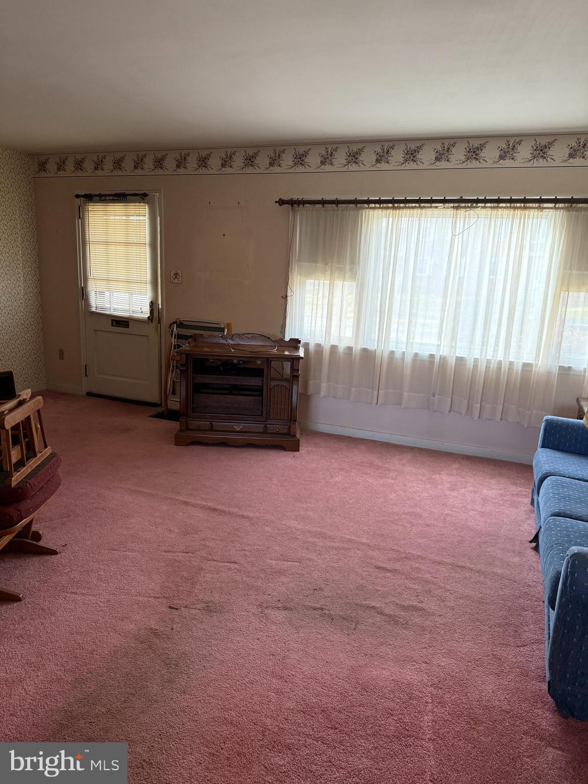 337 Linden Lane Reading, PA 19611 - Photo 2 of 14 an empty room with windows and cabinet