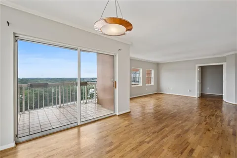a balcony with outdoor view