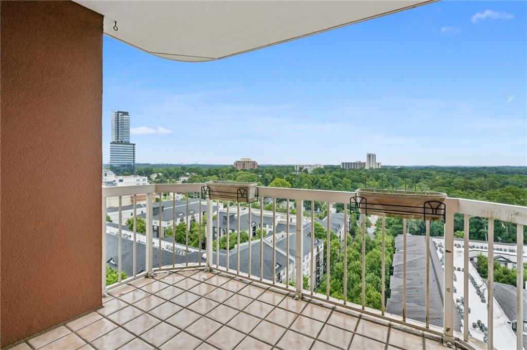 3435 Kingsboro Road Northeast, Unit 1702 Atlanta, GA 30326 - Photo 15 of 35 a balcony with outdoor view
