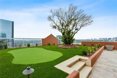 a view of a terrace with furniture