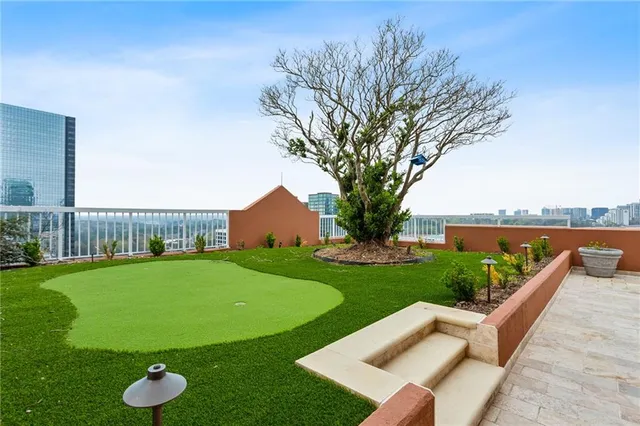 a view of a terrace with furniture