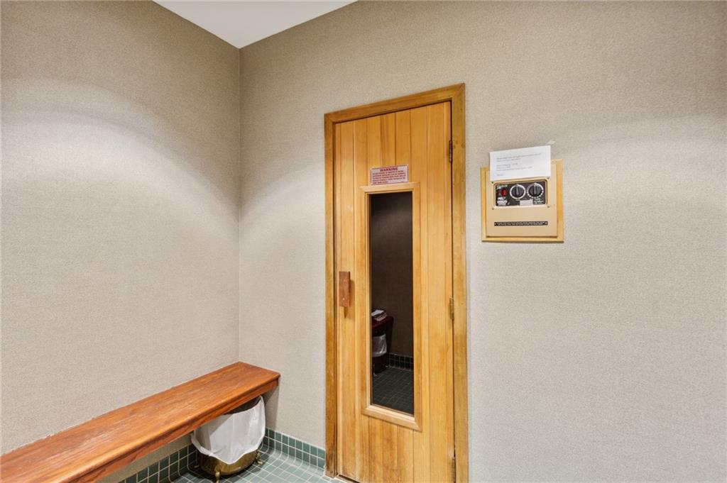 3435 Kingsboro Road Northeast, Unit 1702 Atlanta, GA 30326 - Photo 32 of 35 a room with a door