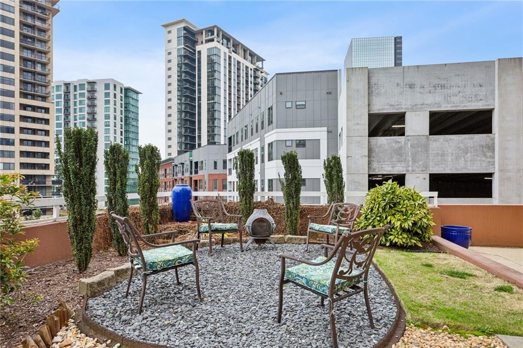 3435 Kingsboro Road Northeast, Unit 1702 Atlanta, GA 30326 - Photo 34 of 35 a house view with outdoor seating space