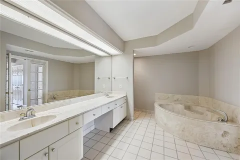 a bathroom with a shower bathtub and shower