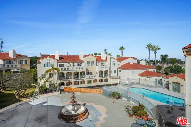 a view of a city with tall buildings