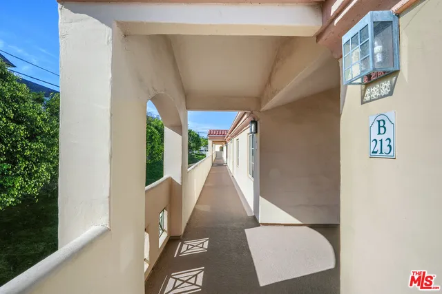 a view of a hallway with entryway