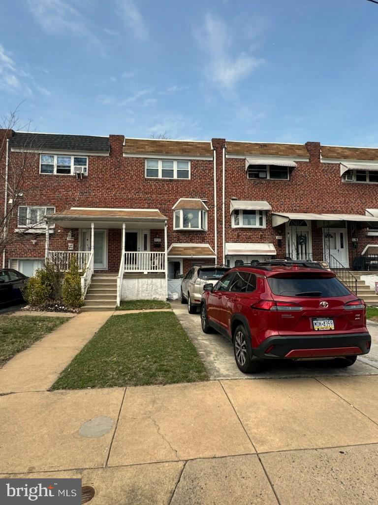 12126 Aster Road Philadelphia, PA 19154 - Photo 1 of 32 a front view of a house with a garden