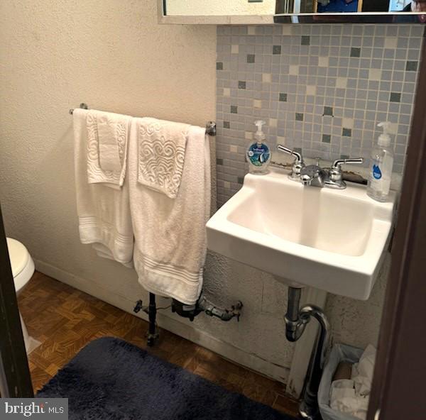 12126 Aster Road Philadelphia, PA 19154 - Photo 25 of 32 a bathroom with a sink and a mirror