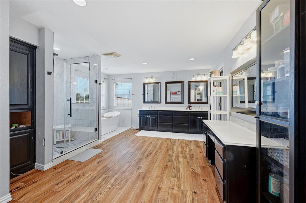 85 Quail Run Road Sherman, TX 75090 - Photo 19 of 31 a bathroom with a sink and a shower