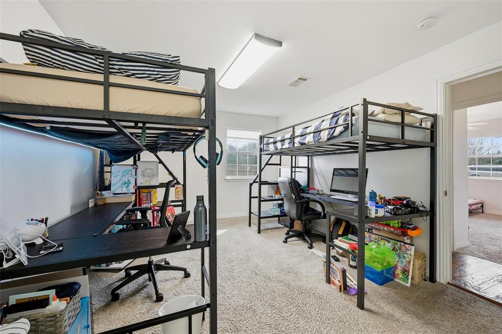 85 Quail Run Road Sherman, TX 75090 - Photo 25 of 31 a view of a storage room with a lot of stuff