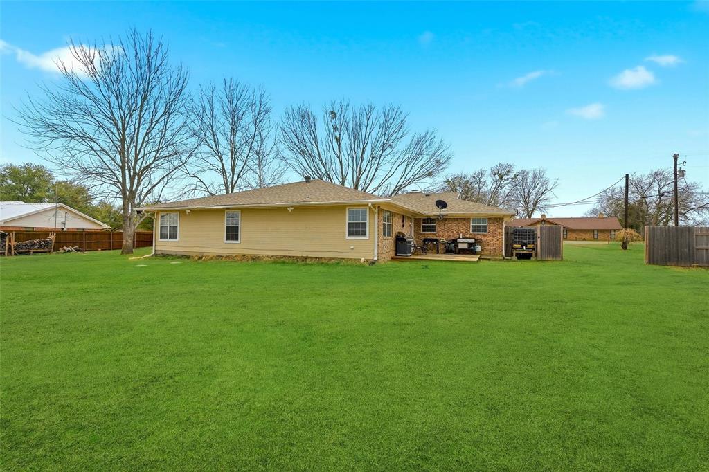 85 Quail Run Road Sherman, TX 75090 - Photo 29 of 31 a front view of a house with garden