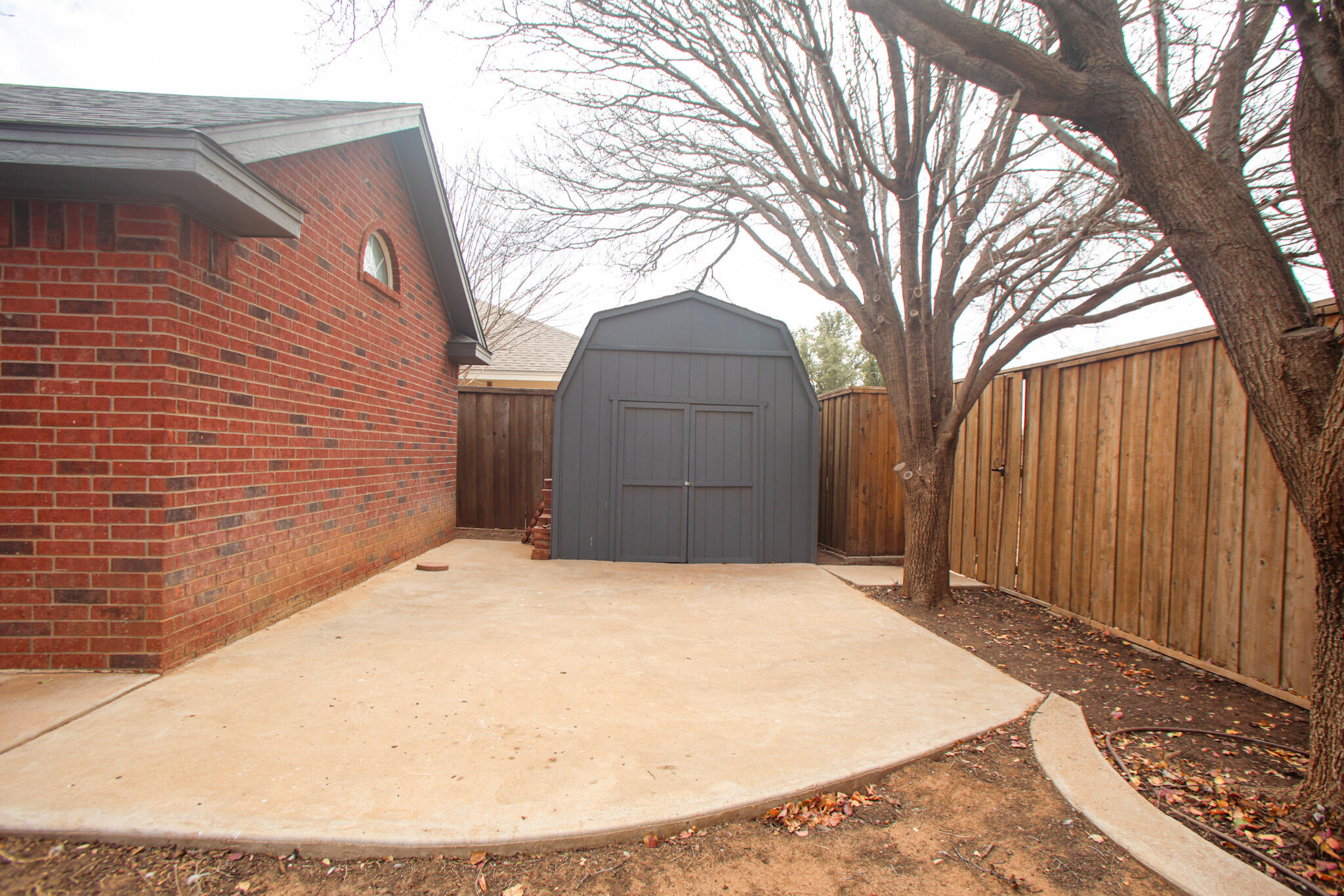 6916 Fulton Avenue Lubbock, TX 79424 - Photo 22 of 24 a backyard of a house