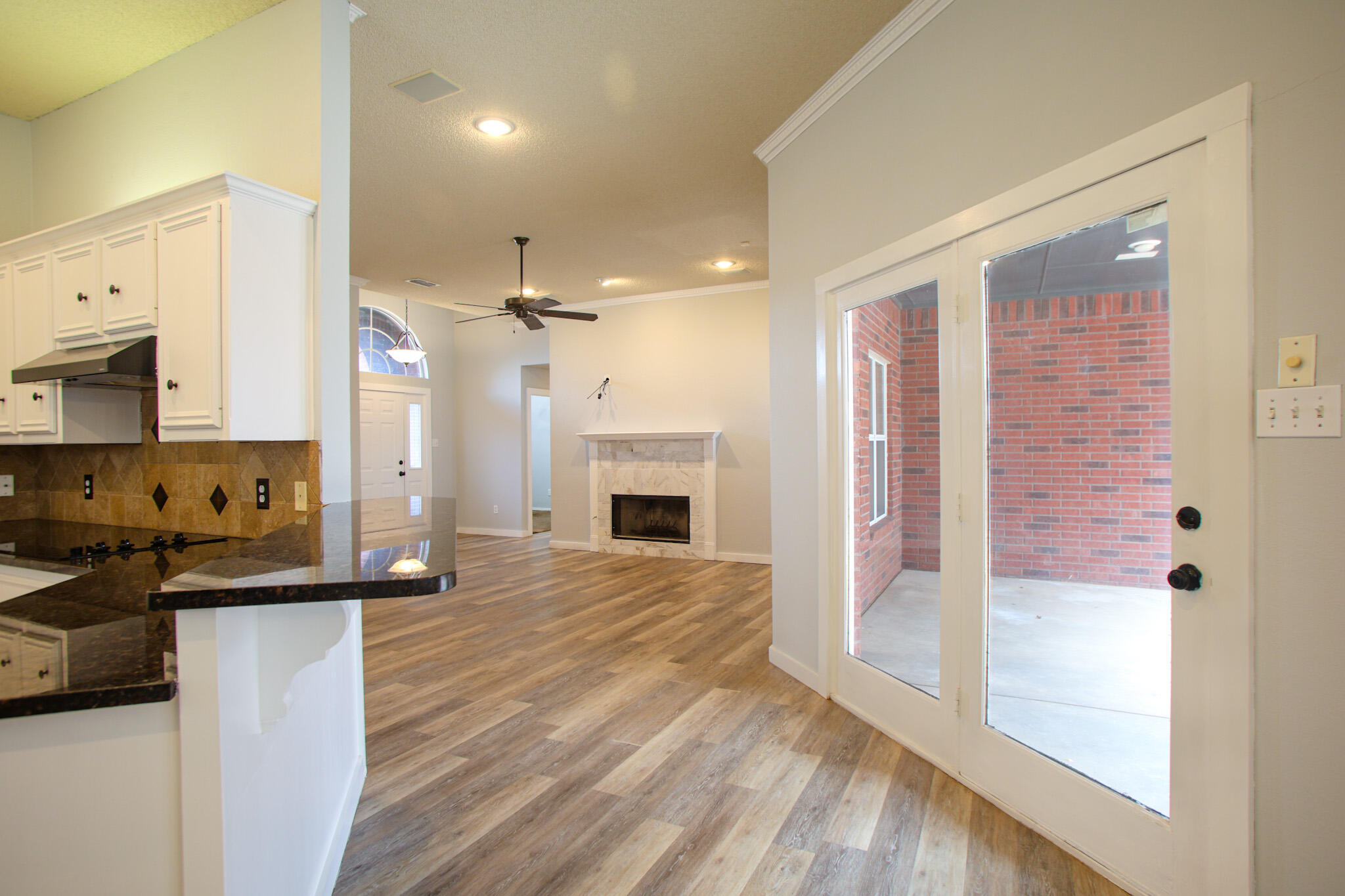 6916 Fulton Avenue Lubbock, TX 79424 - Photo 6 of 24 a view of a kitchen cabinets and a stove top oven