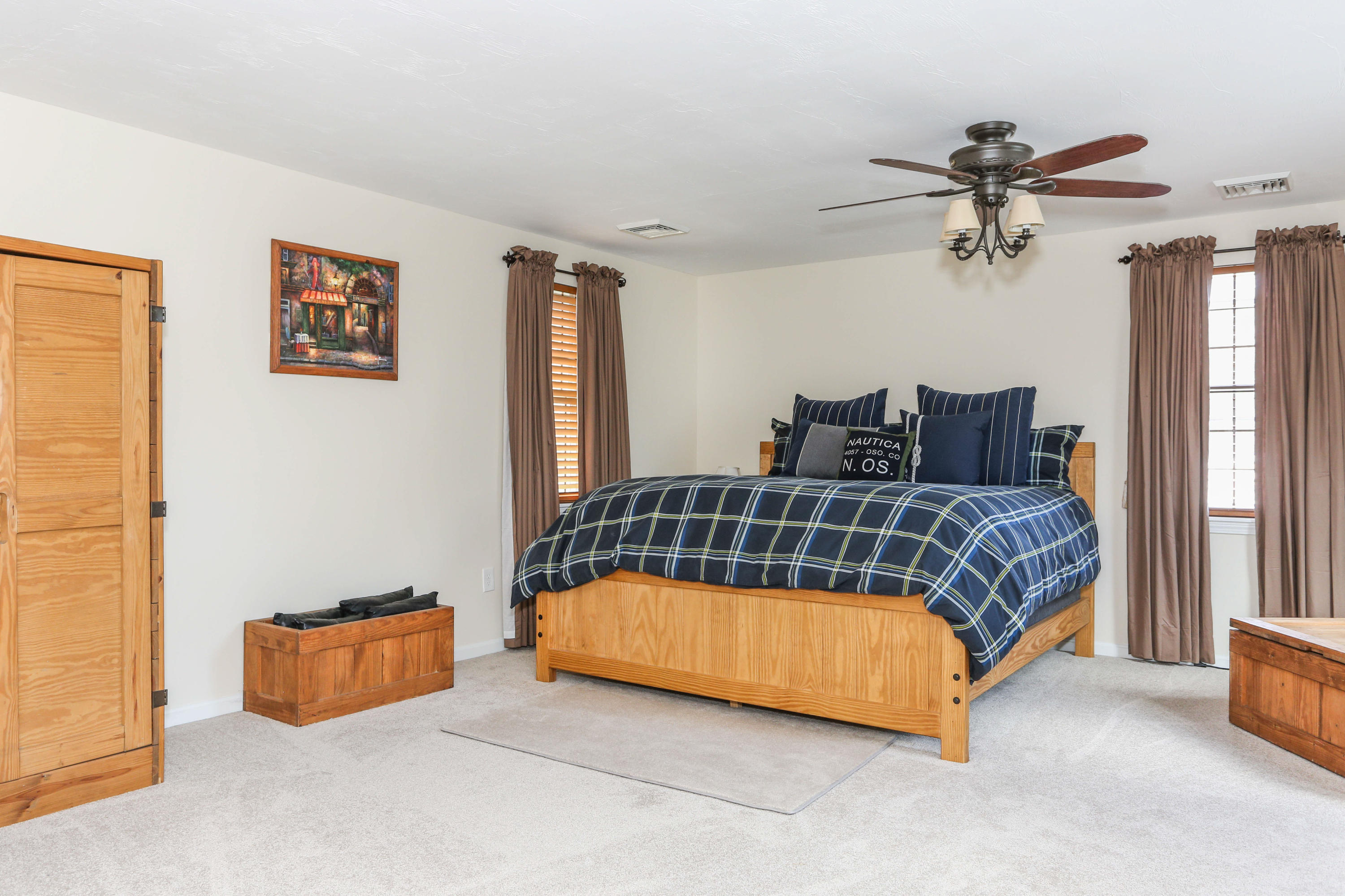 385 Skunknet Road Centerville, MA 02632 - Photo 26 of 32 a bedroom with a bed and window