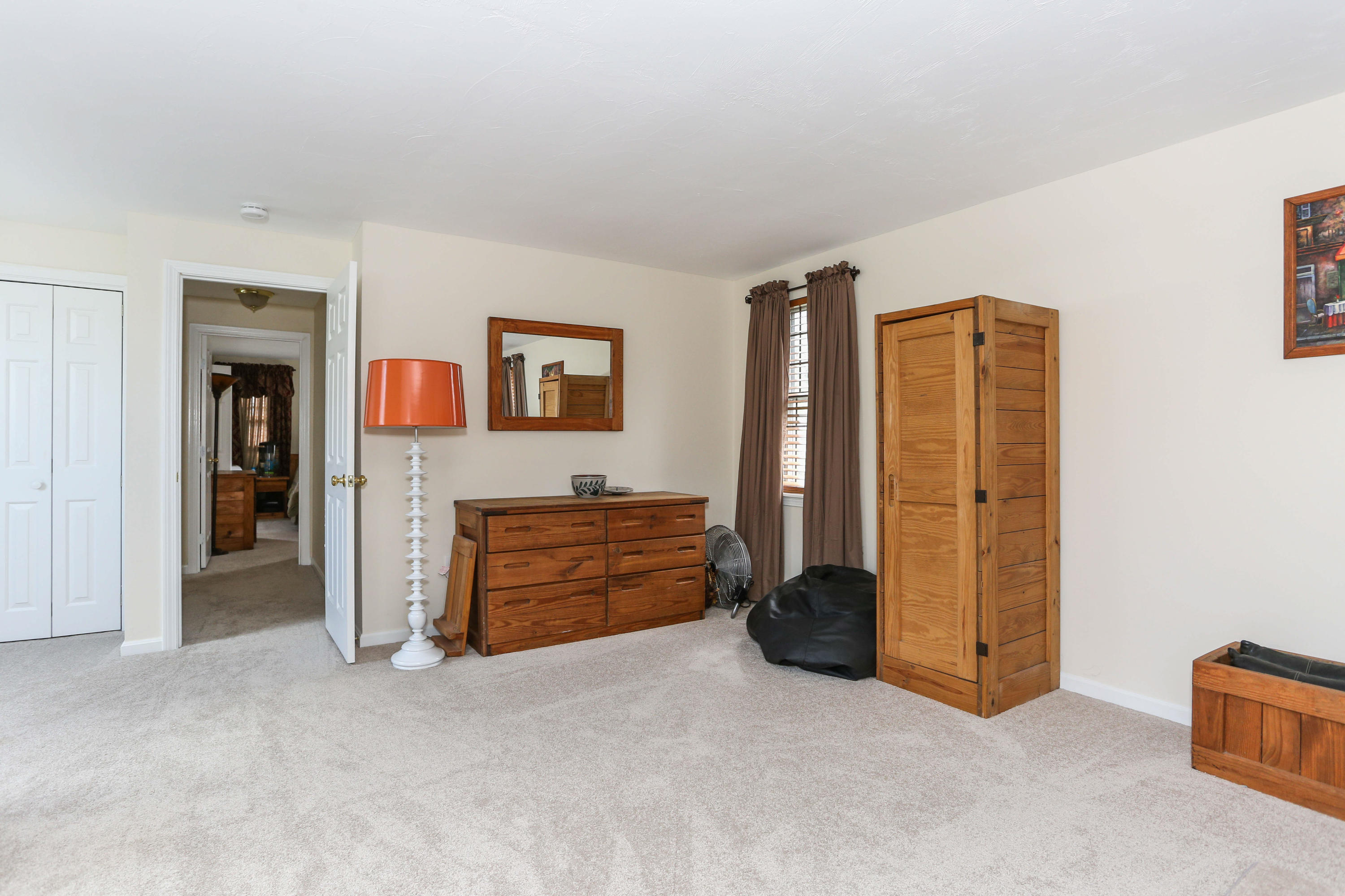 385 Skunknet Road Centerville, MA 02632 - Photo 28 of 32 a view of room with furniture and closet