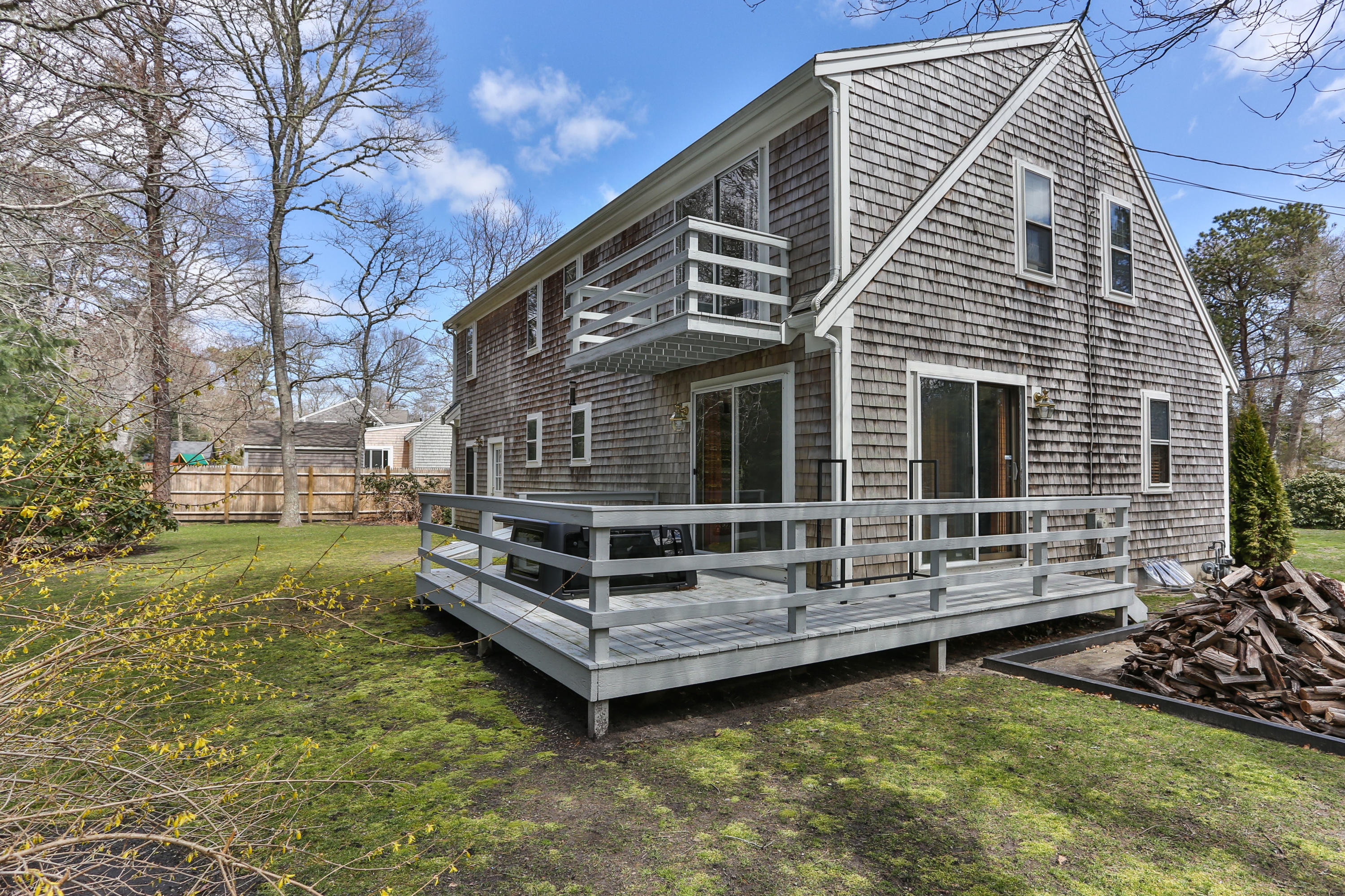 385 Skunknet Road Centerville, MA 02632 - Photo 5 of 32 a view of a house with a yard