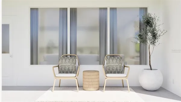 a view of a patio with a table and chairs