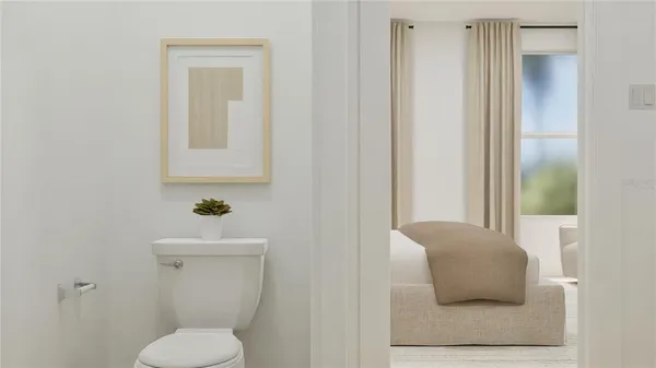 a bedroom with a bed and a night stand