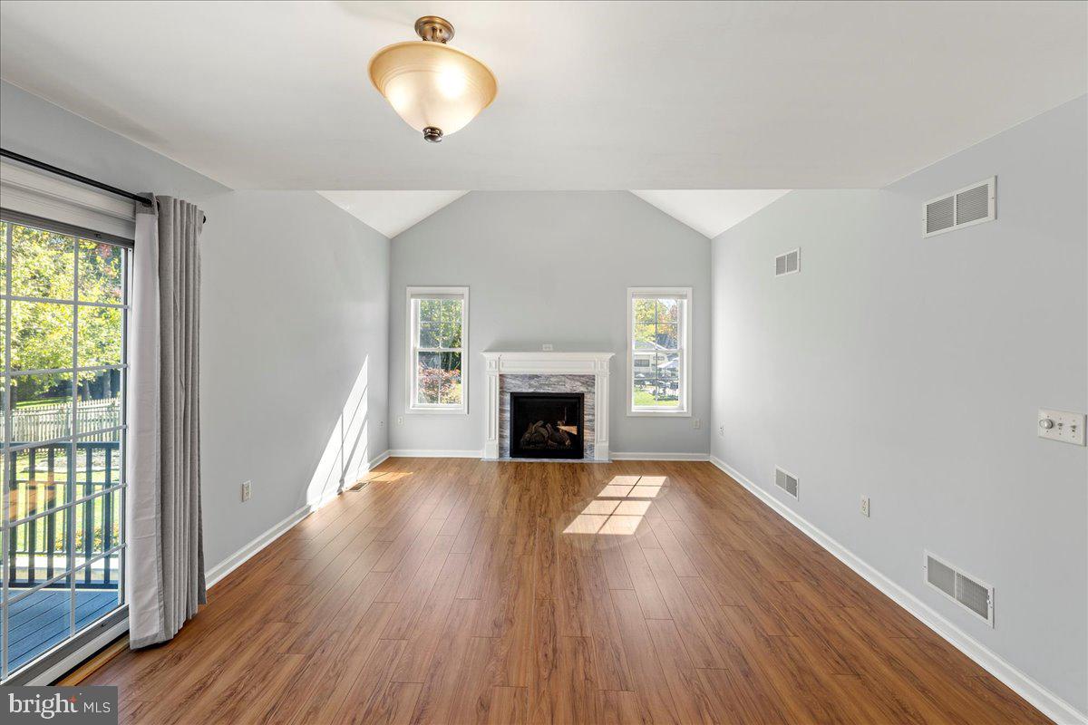 8 Pheasant Trail Fairfield, PA 17320 - Photo 20 of 69 a view of an empty room with wooden floor and a window