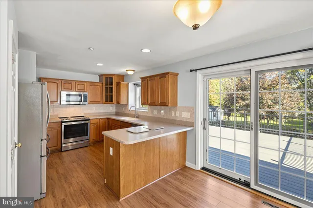 a view of a hallway with stairs
