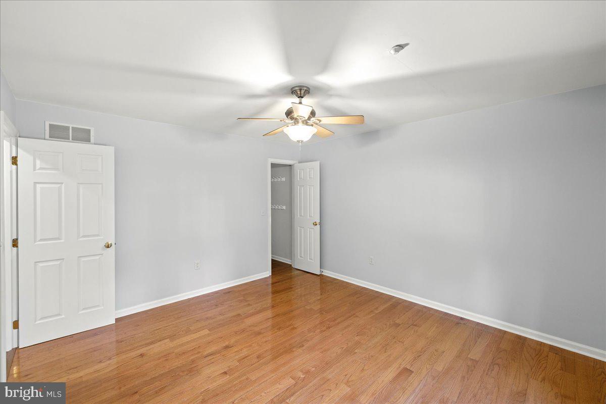 8 Pheasant Trail Fairfield, PA 17320 - Photo 30 of 69 wooden floor in an empty room with a window