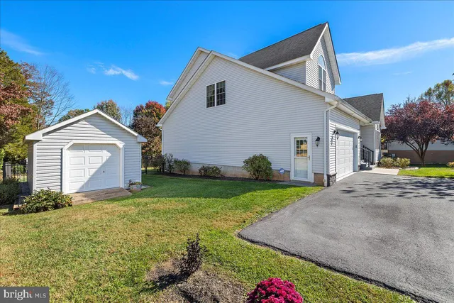 a aerial view of a house with swimming pool