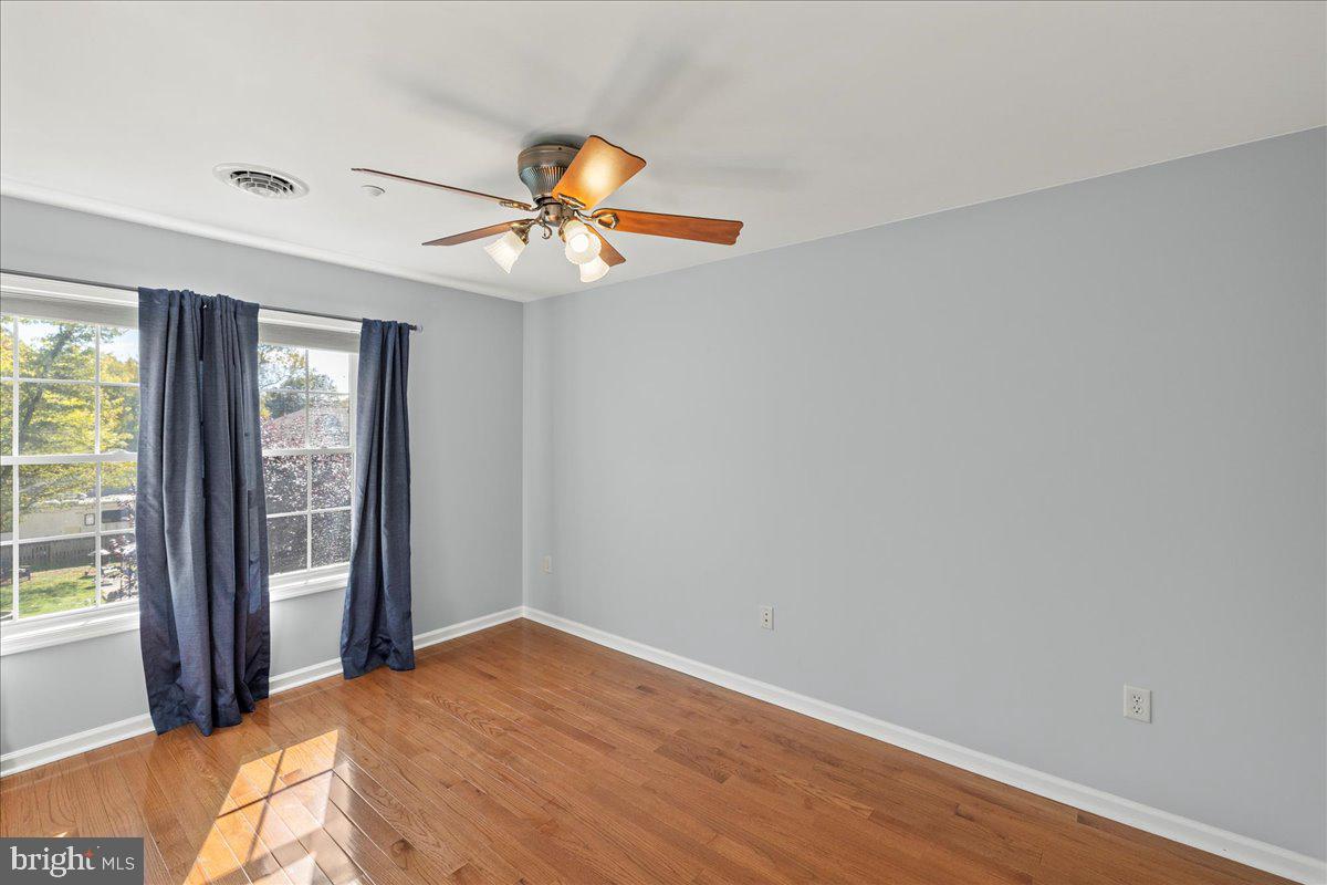 8 Pheasant Trail Fairfield, PA 17320 - Photo 49 of 69 wooden floor in an empty room with a window