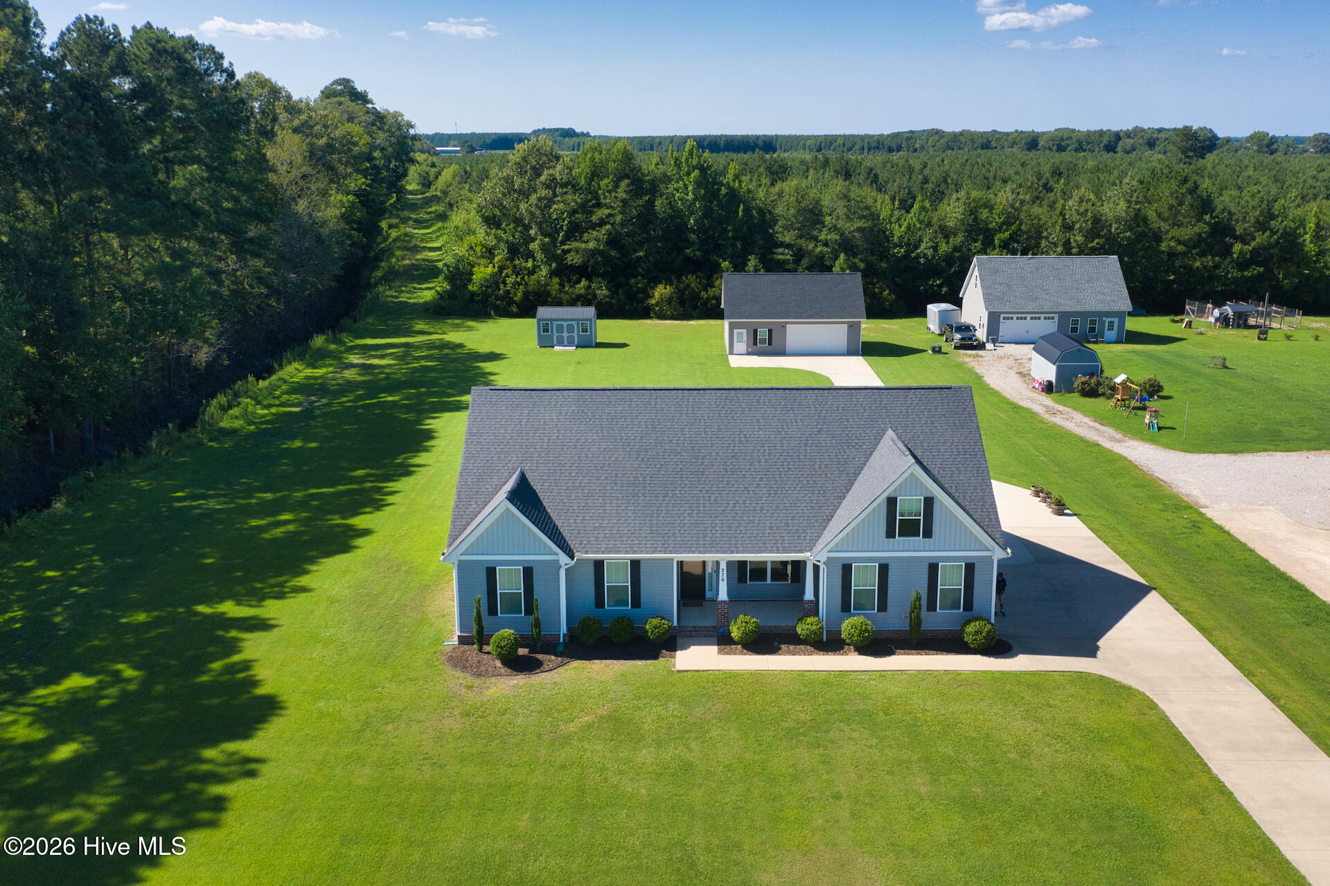 270 Keeter Barn Road South Mills, NC 27976 - Photo 1 of 45 WELCOME HOME!! 3.3 ACRES W/ 2 CAR DETACHED GARAGE/WORKSHOP!