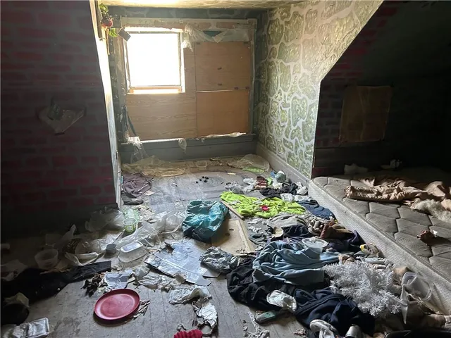 a bathroom with a sink toilet and a mirror