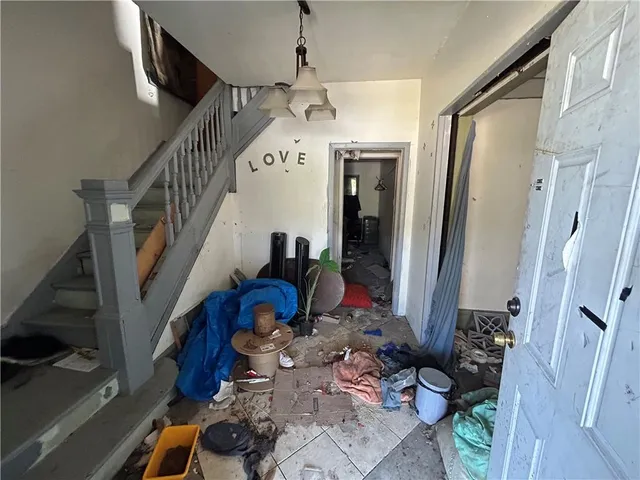 a view of entryway with wooden floor