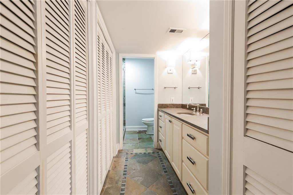 82 Montre Square Northwest Atlanta, GA 30327 - Photo 20 of 44 a bathroom with a sink and a mirror