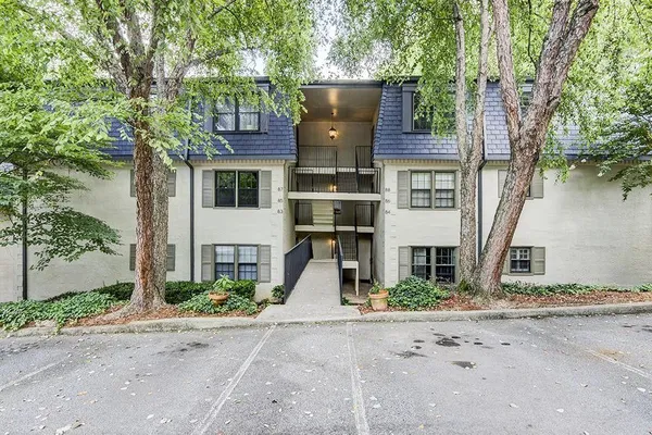 front view of a house with a street