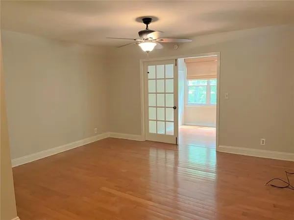 a view of an empty room with a window