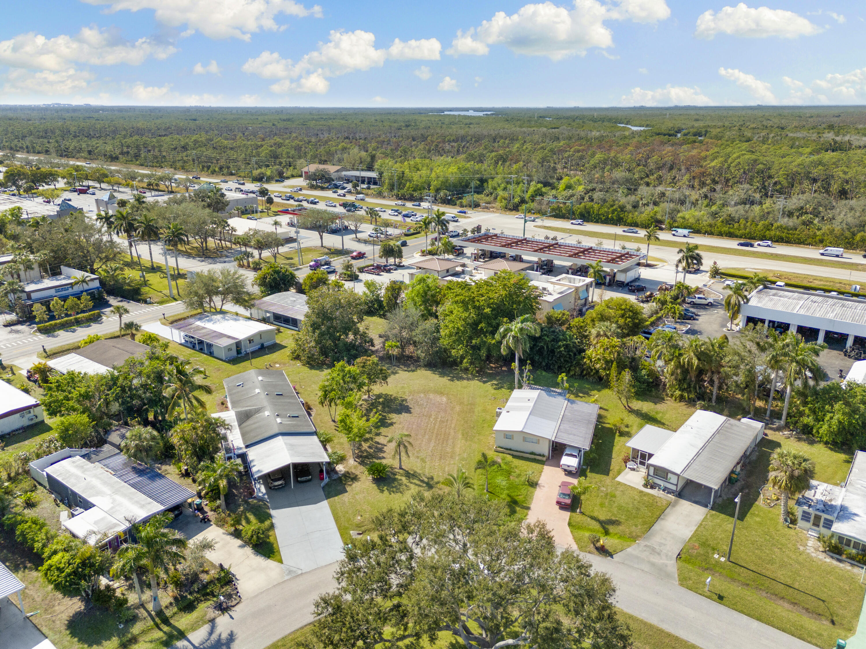 147 Rookery Road Naples, FL 34114 - Photo 2 of 11 an aerial view of residential houses with outdoor space