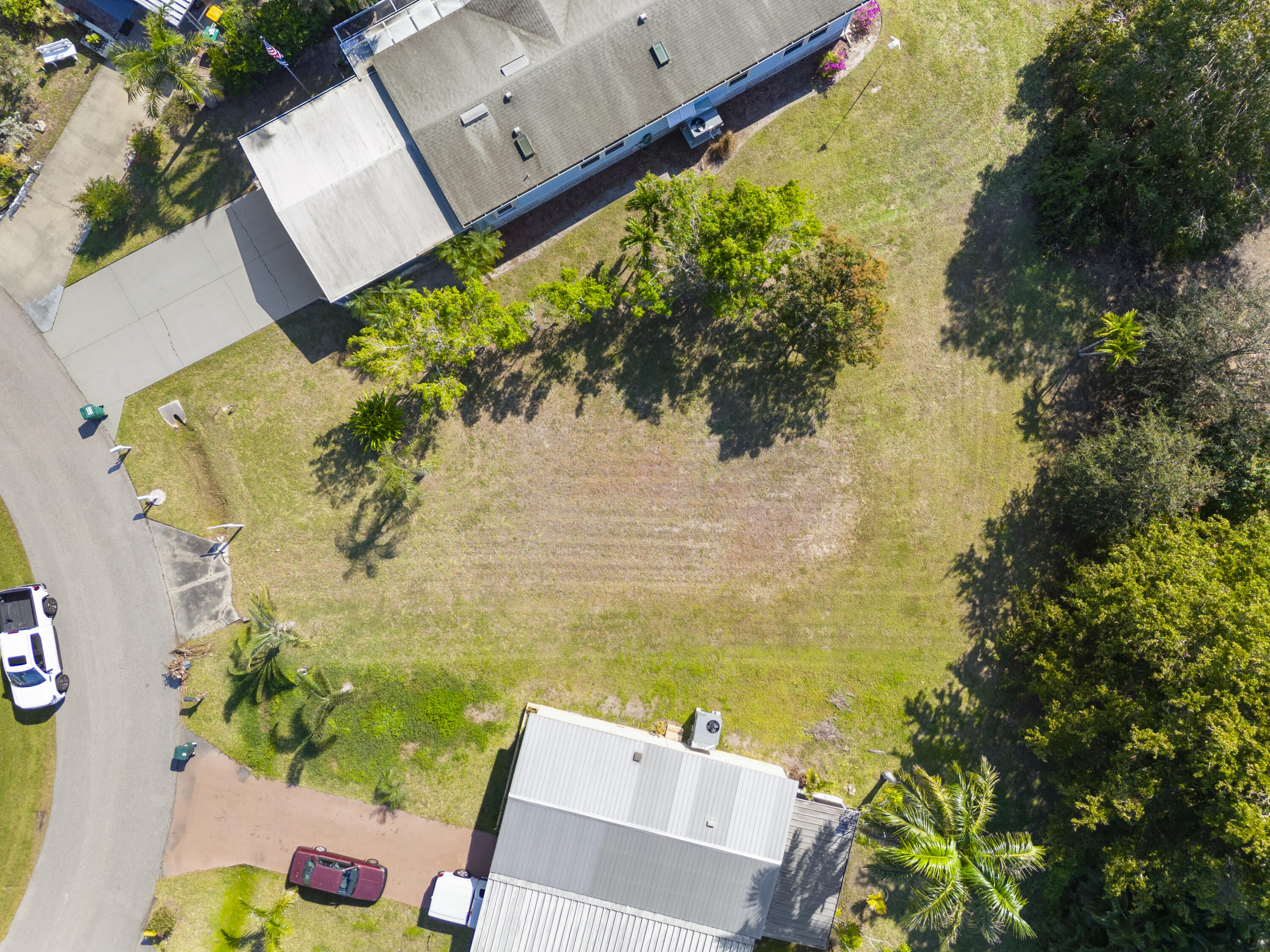 147 Rookery Road Naples, FL 34114 - Photo 8 of 11 an aerial view of a house with a lake view