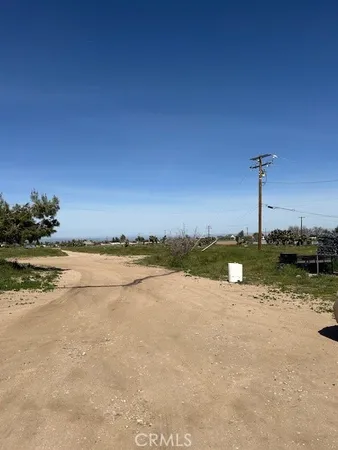 a view of a lake from a yard