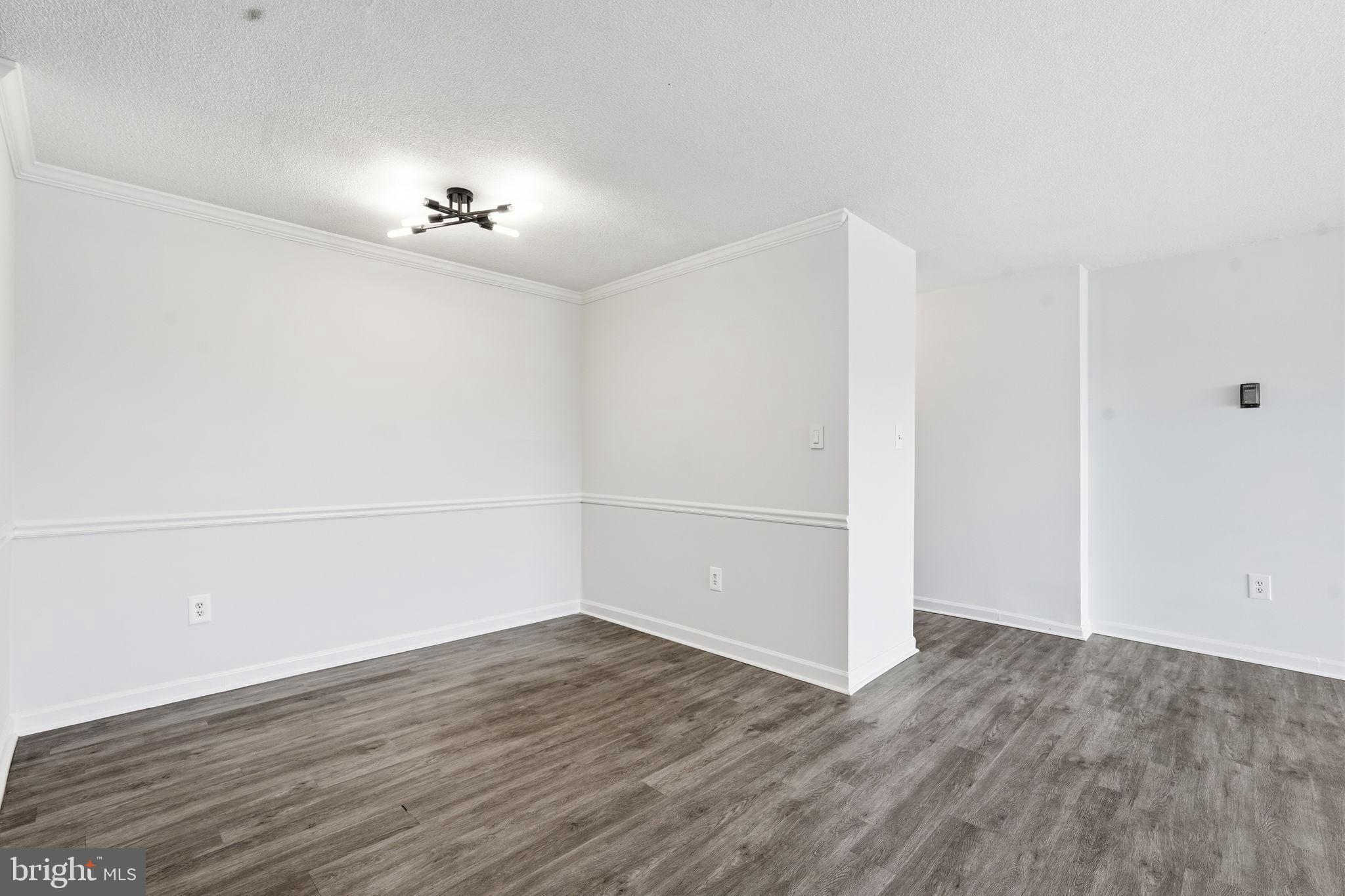 4600 South Four Mile Run Drive, Unit 613 Arlington, VA 22204 - Photo 14 of 24 wooden floor in an empty room