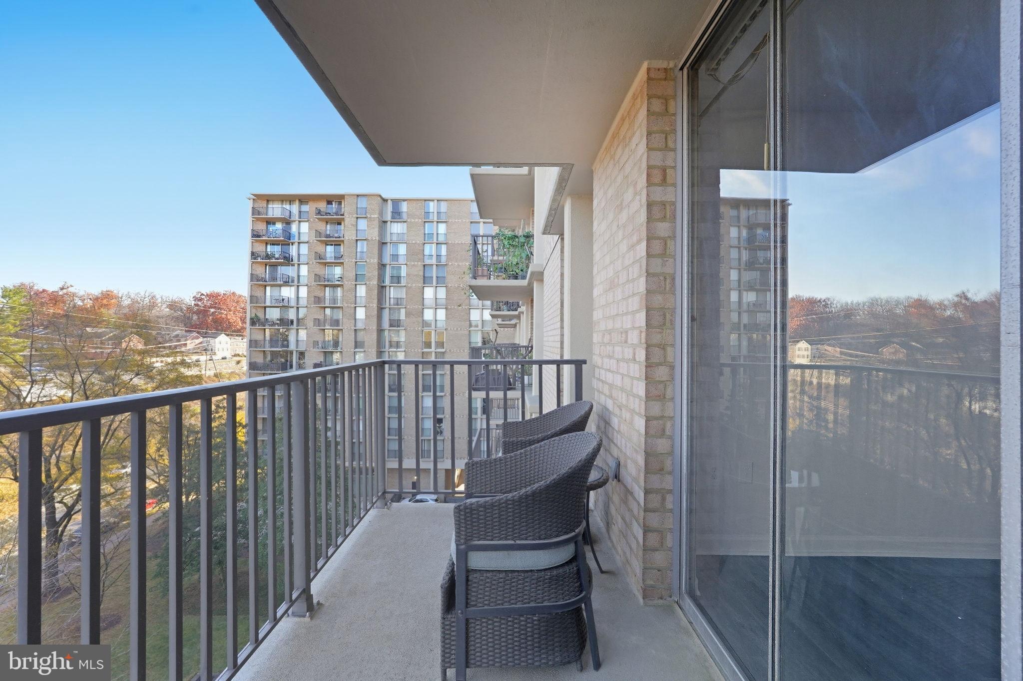 4600 South Four Mile Run Drive, Unit 613 Arlington, VA 22204 - Photo 22 of 24 a view of balcony with furniture