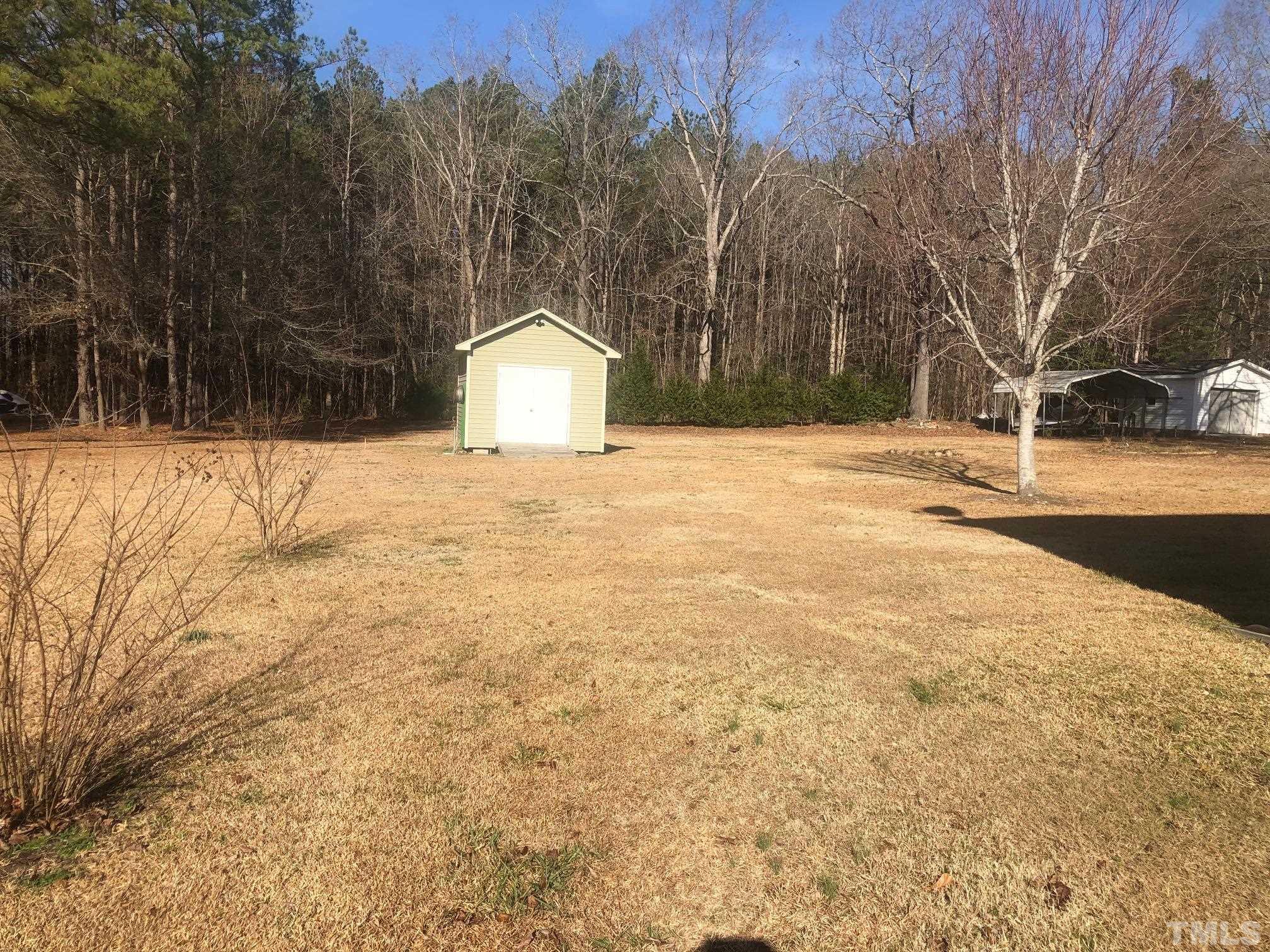 770 Cross Link Drive Angier, NC 27501 - Photo 17 of 23 a view of large yard and trees