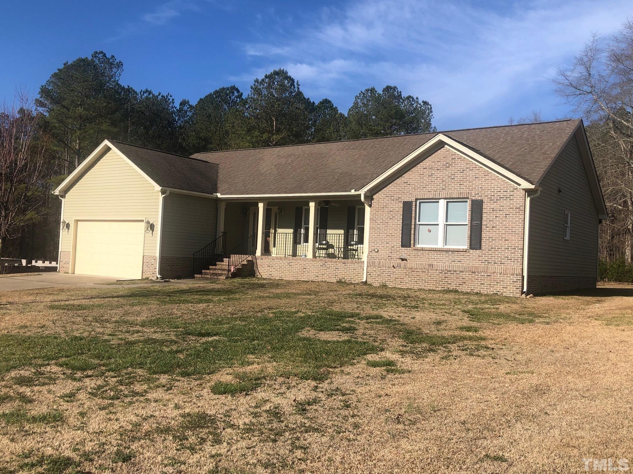 770 Cross Link Drive Angier, NC 27501 - Photo 19 of 23 a front view of a house with a yard