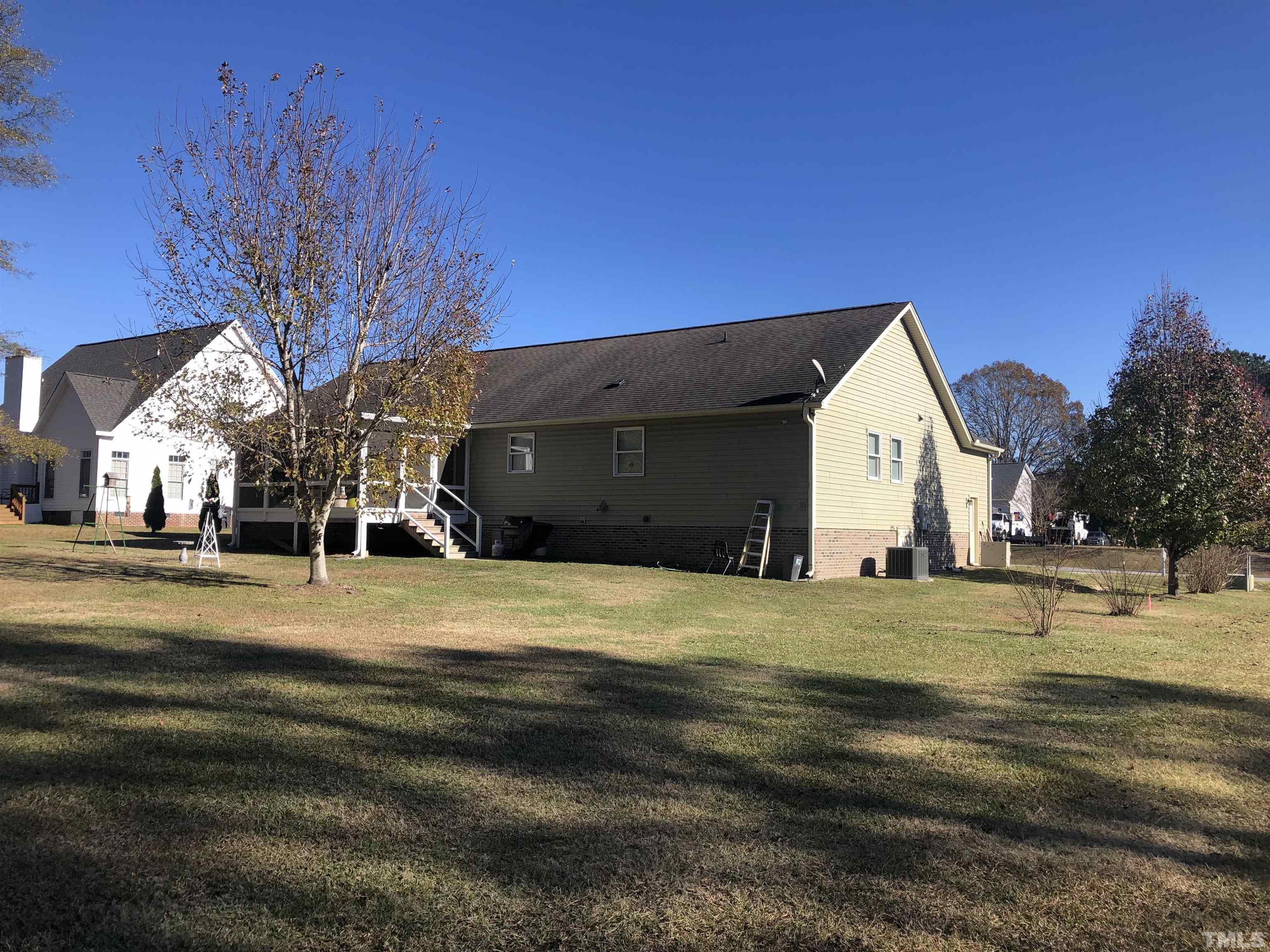 770 Cross Link Drive Angier, NC 27501 - Photo 22 of 23 a view of a yard in front of a house